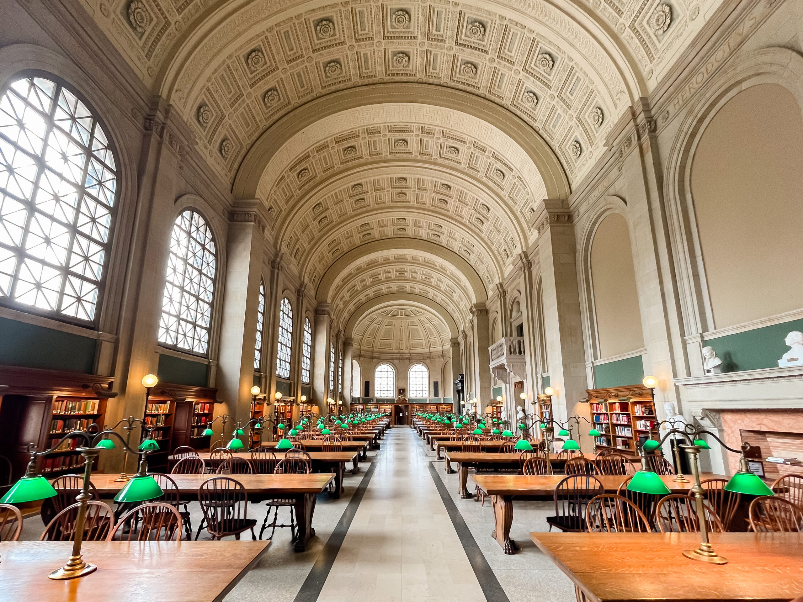 Bates Hall at the Boston Public Library is a wedding venue rich in history and charm. Bates Hall is located in the main McKim building and is easily the most recognizable room in the library. Bates Hall features a 50’ high barrel vault ceiling, walls covered in oak-paneled bookshelves, and large oak tables topped with green reading lanterns. Bates Hall is recognized to be, architecturally, one of the most noteworthy rooms in the world. With a capacity to seat 300 for an indoor ceremony and dinner and dancing, this stunning space is the perfect venue for providing you and your guests a luxe experience you will never forget.  