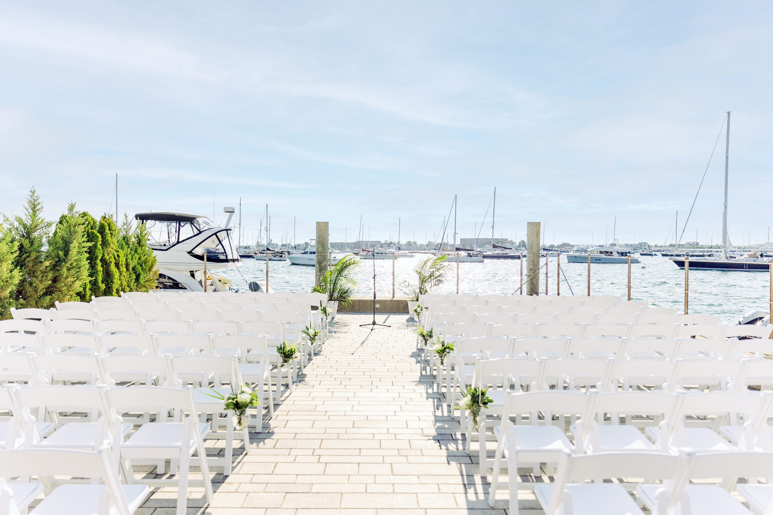 The Bohlin's ceremony site sits at the edge of the marina overlooking views of Newport Harbor.